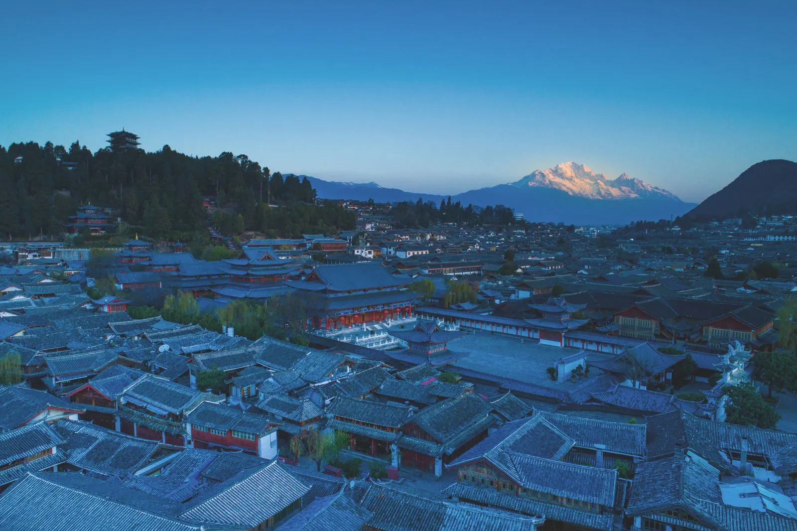 Lijiang Old Town rooftops on a private Yunnan tour
