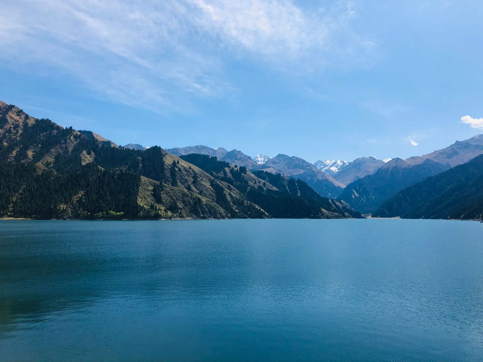 Heavenly Lake and snow-capped Tian Shan Mountains near Urumqi, Xinjiang
